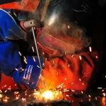 male welding wearing ppe