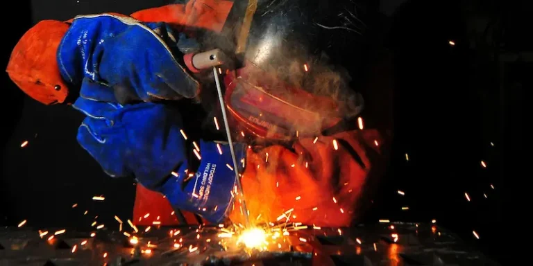male welding wearing ppe