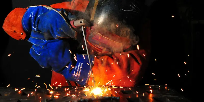 male welding wearing ppe