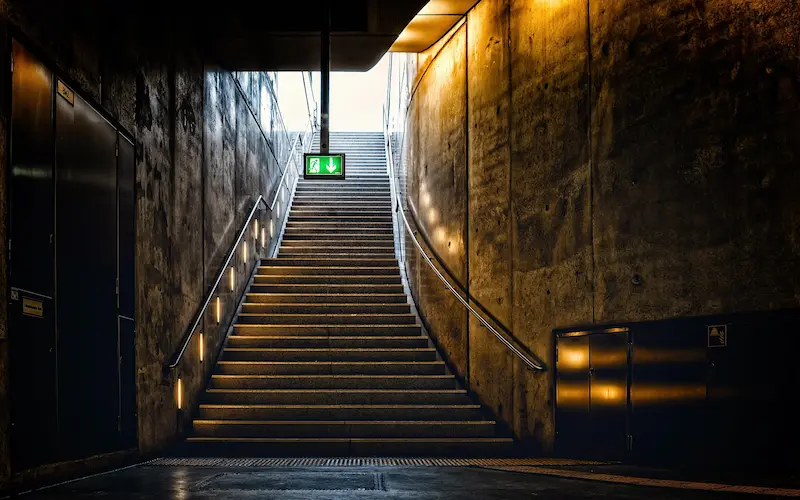 escape route with stairs and exit sign